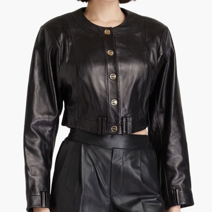 Model wearing Sierra cropped black leather jacket with gold buttons and classic collar