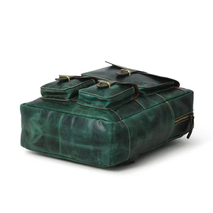Green leather bag with multiple compartments on a white background