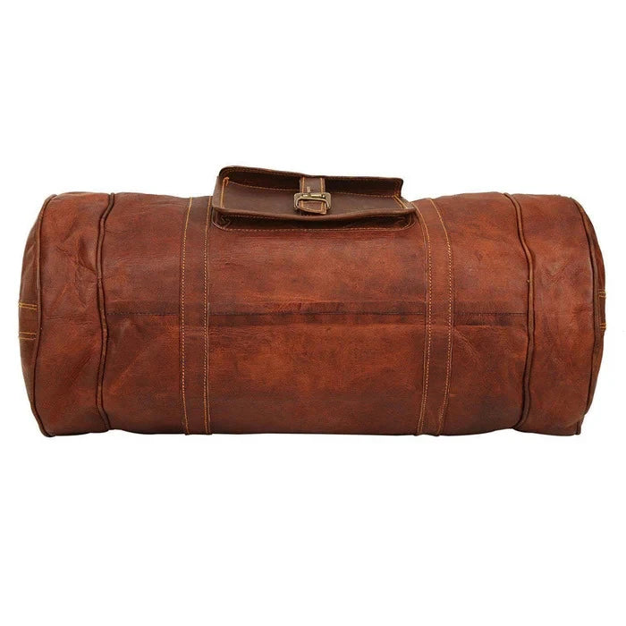 Brown leather duffel bag on a white background