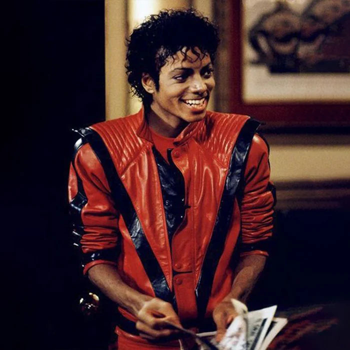A person wearing a red and black leather jacket with a stand-up collar, inspired by Michael Jackson's style from the Thriller music video.
