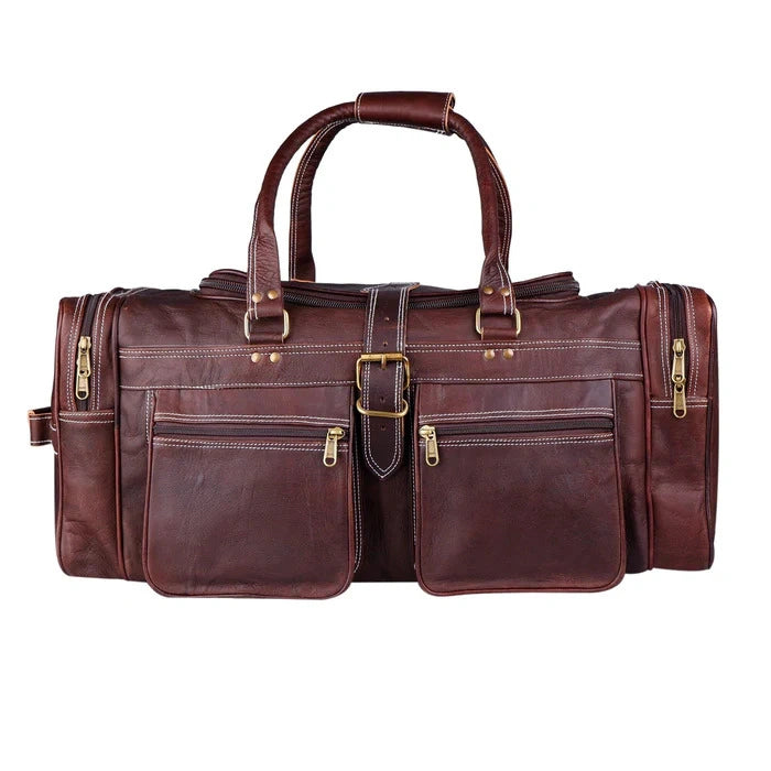 Brown leather duffel bag with gold buckles on a white background