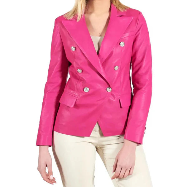 A woman wearing a vibrant pink double-breasted leather coat with silver-tone metallic buttons and a notched lapel collar.