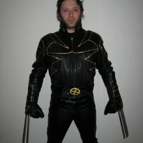 A person wearing a black leather jacket with yellow piping, a stand-up collar, and holding two metal blades, resembling the X-Men Wolverine costume.
